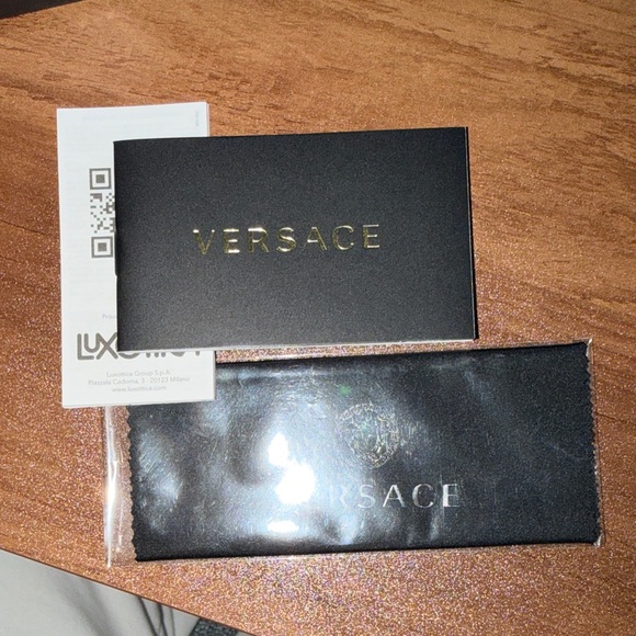 Versace Black and Gold Sunglasses with Iconic Medusa Emblem - Picture 6 of 7